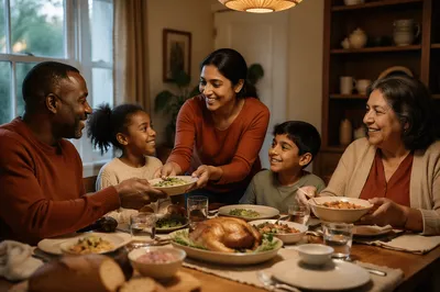 Multigenerational Family Laughing at Dinner Table