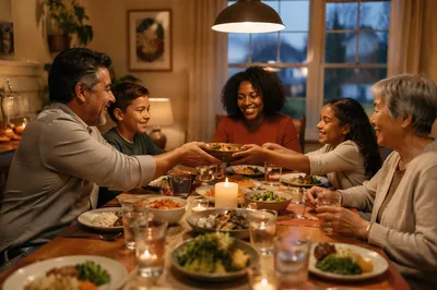Multigenerational Family Laughing at Dinner Table