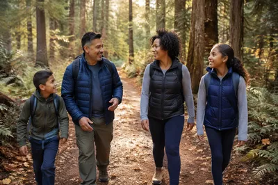 Family Hiking on Autumn Forest Trail