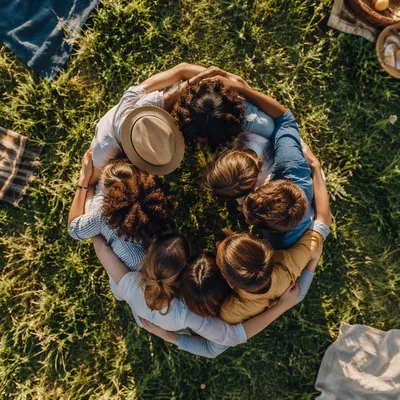 Friends Group Hug Circle in Sunny Meadow
