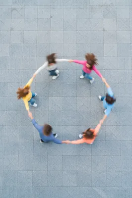 Overhead Friends Group Hug in Colorful Motion