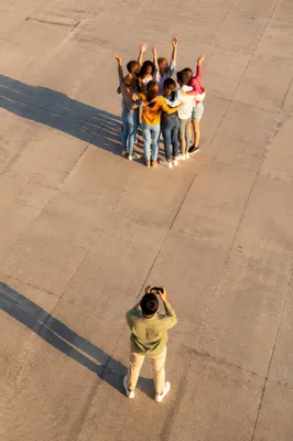 Joyful Friends Group Hug From Above