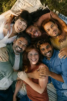 Six Friends Hugging in Park Circle