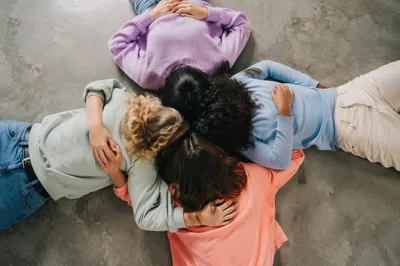 Overhead Circle Hug With Diverse Friends