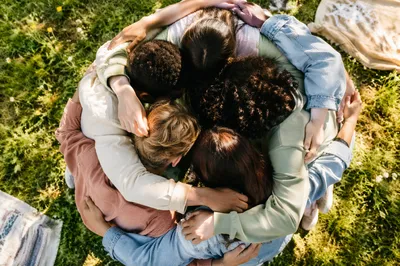 Joyful Friends Group Hug From Above