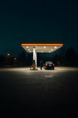 Evening Car Fueling at Quiet Gas Station