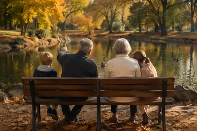 Grandparents and Grandchildren on Autumn Park Bench