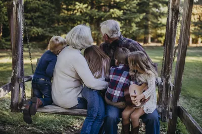 Grandparents and Grandchildren on Park Bench