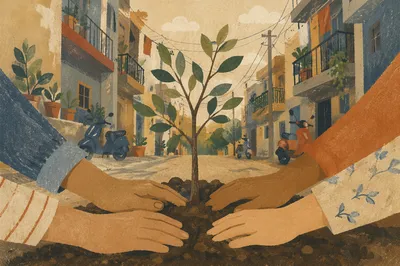 Community Hands Planting Urban Sapling