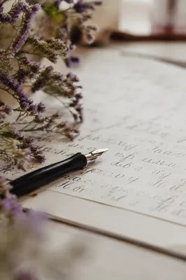 Calligraphy Practice with Ink Pen and Lavender