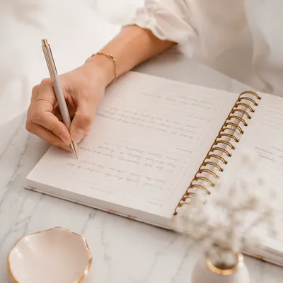 Hand Writing in Morning Prayer Journal
