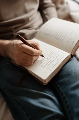 Hands Writing in a Quiet Prayer Journal