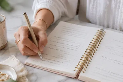 Hand Writing in a Prayer Journal