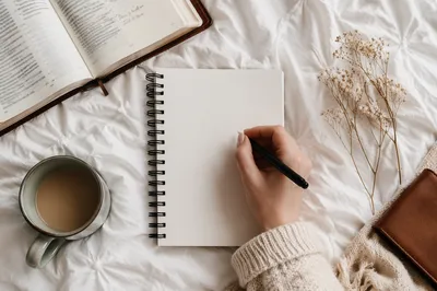 Hand Writing in Morning Prayer Journal