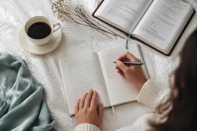 Hand Writing in Prayer Journal Morning Scene