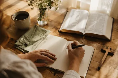Morning Hands Writing in Prayer Journal