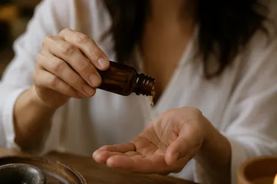 Hands Anointing With Oil in Prayer