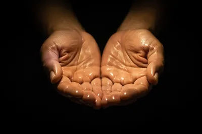 Anointed Hands in Prayer for Healing