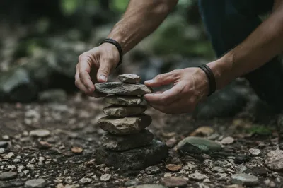 Hands Building Outdoor Stone Altar