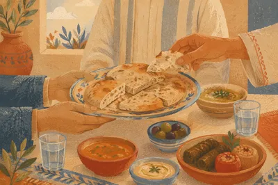 Hands Sharing Bread at Warm Communal Table