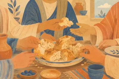 Hands Sharing Rustic Bread at Table