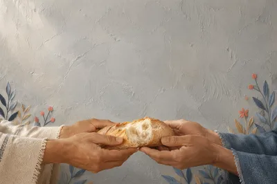 Hands Sharing Rustic Bread in Gentle Light