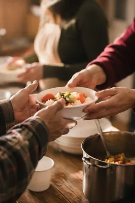 Compassionate Hands Serving Warm Community Meals