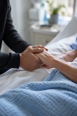 Hospital Bedside Prayer and Comforting Hands