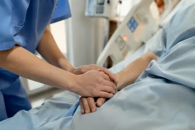 Hospital Bedside Prayer and Comforting Hands