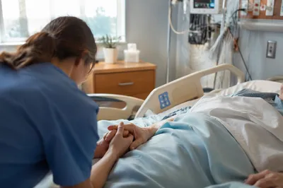 Hospital Bedside Prayer and Hand Holding