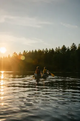 Kids Summer Camp Canoe on Calm Lake