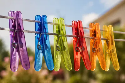 Sunlit Clothespins on Backyard Clothesline