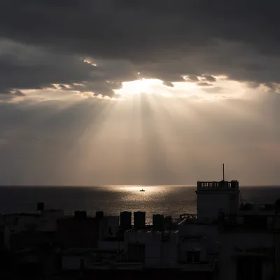 Hopeful Sunlight Breaking Through Storm Clouds