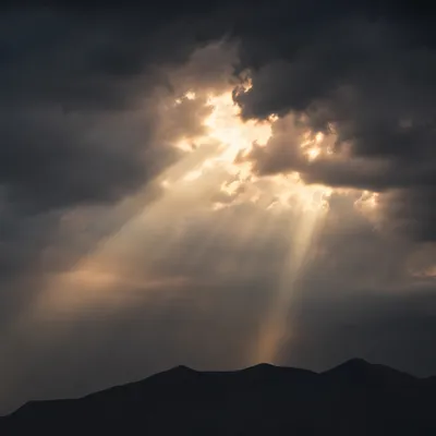 Golden Light Breaking Through Storm Clouds