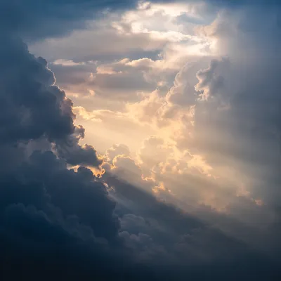 Golden Light Breaking Through Storm Clouds