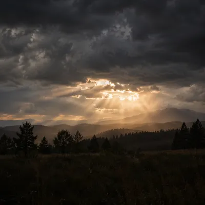 Golden Light Breaking Through Storm Clouds