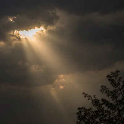 Sunlight Breaking Through Storm Clouds