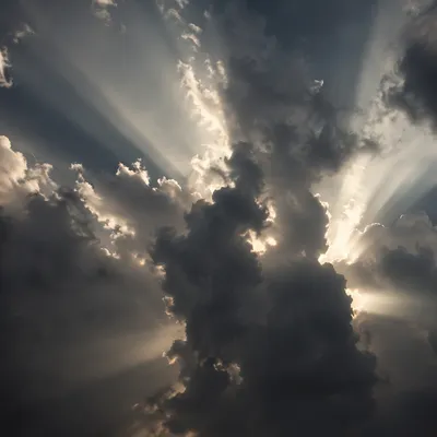 Hopeful Sunlight Breaking Through Storm Clouds