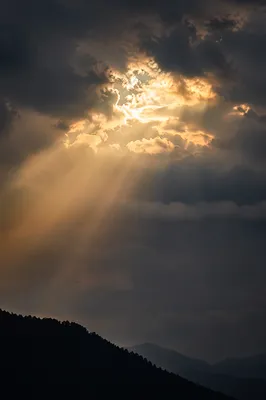 Golden Hope Breaking Through Storm Clouds