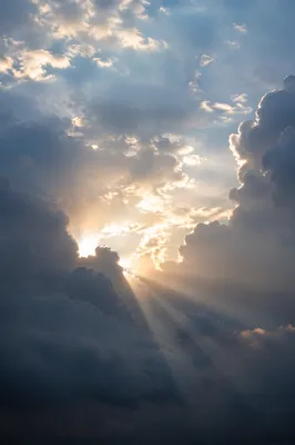 Golden Light Breaking Through Storm Clouds