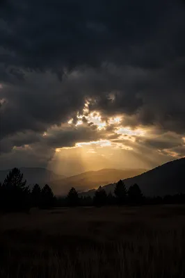 Golden Light Breaking Through Storm Clouds