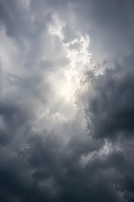 Hopeful Light Breaking Through Storm Clouds