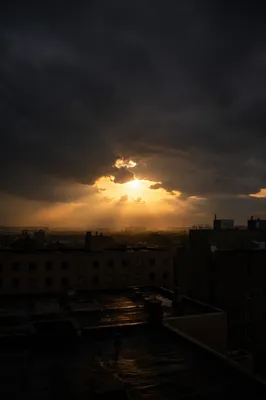 Golden Light Breaking Through Storm Clouds