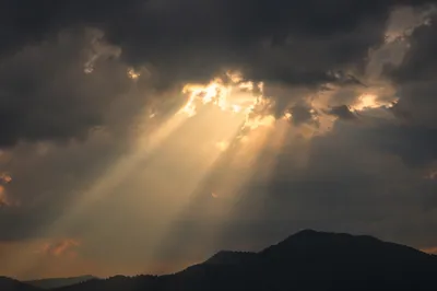 Golden Hope Breaking Through Storm Clouds