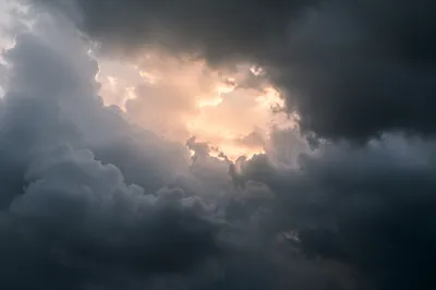 Hopeful Light Through Storm Clouds