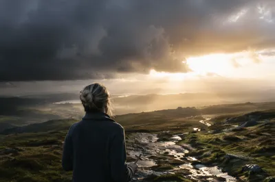 Hopeful Sunlight Through Storm Clouds