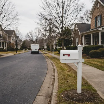 White Mailbox on Quiet Suburban Street