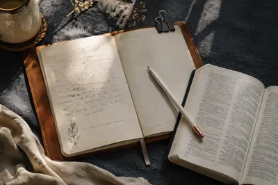 Open Notebook with Handwritten Scripture Notes