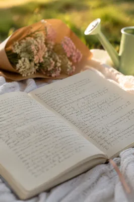 Open Notebook on Blanket Outdoors