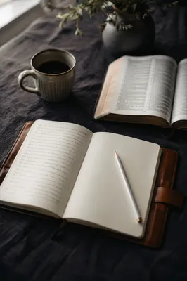 Open Notebook with Handwritten Scripture Notes
